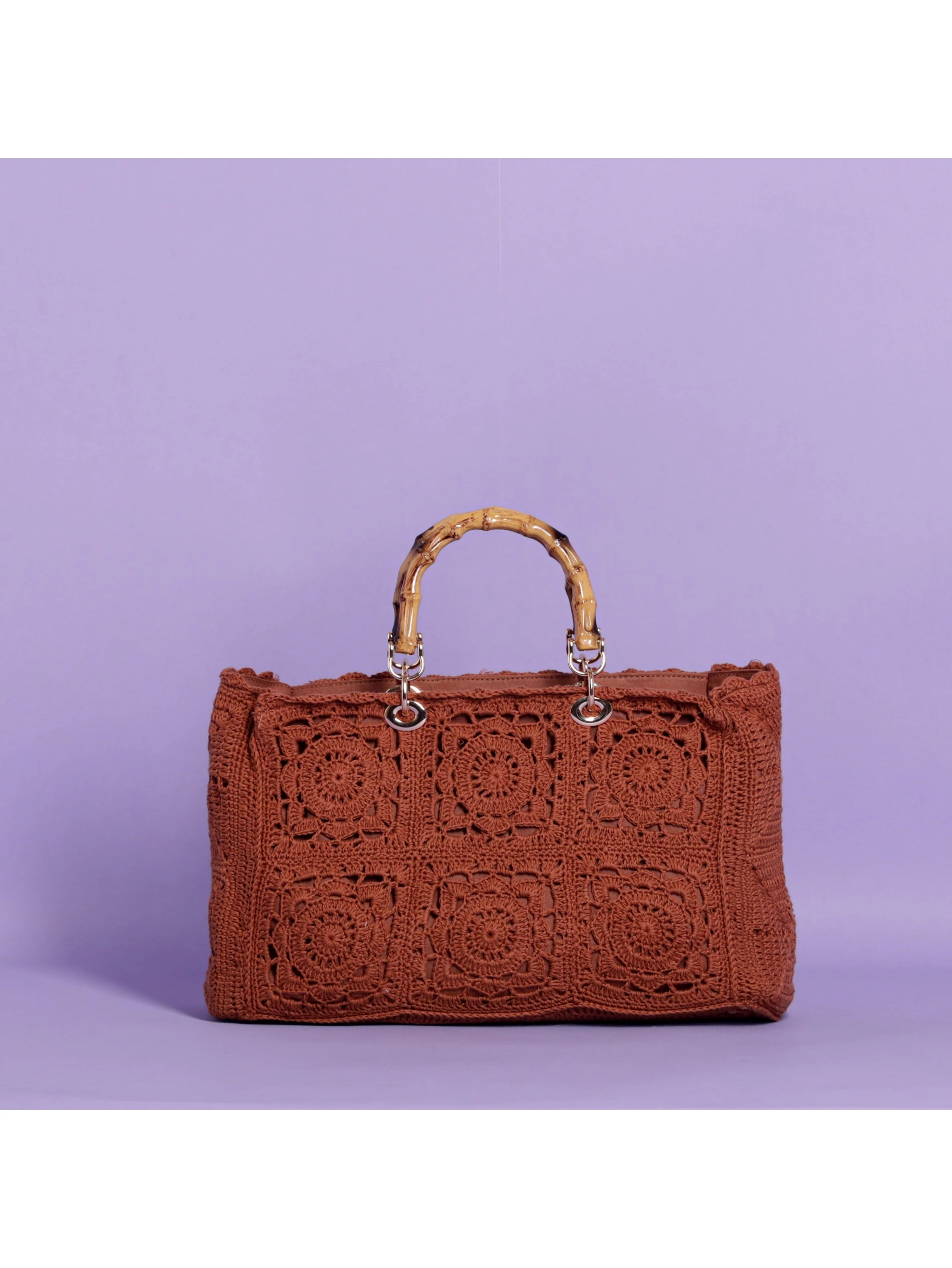 BORSA A MANO EFFETTO UNCINETTO