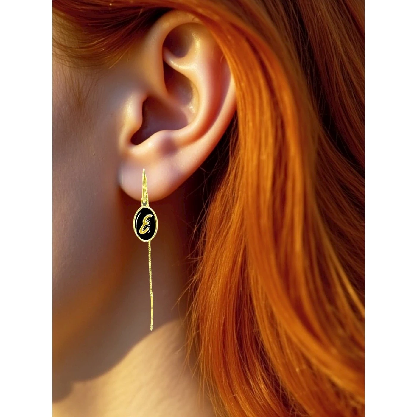 Orecchino Lettera E
