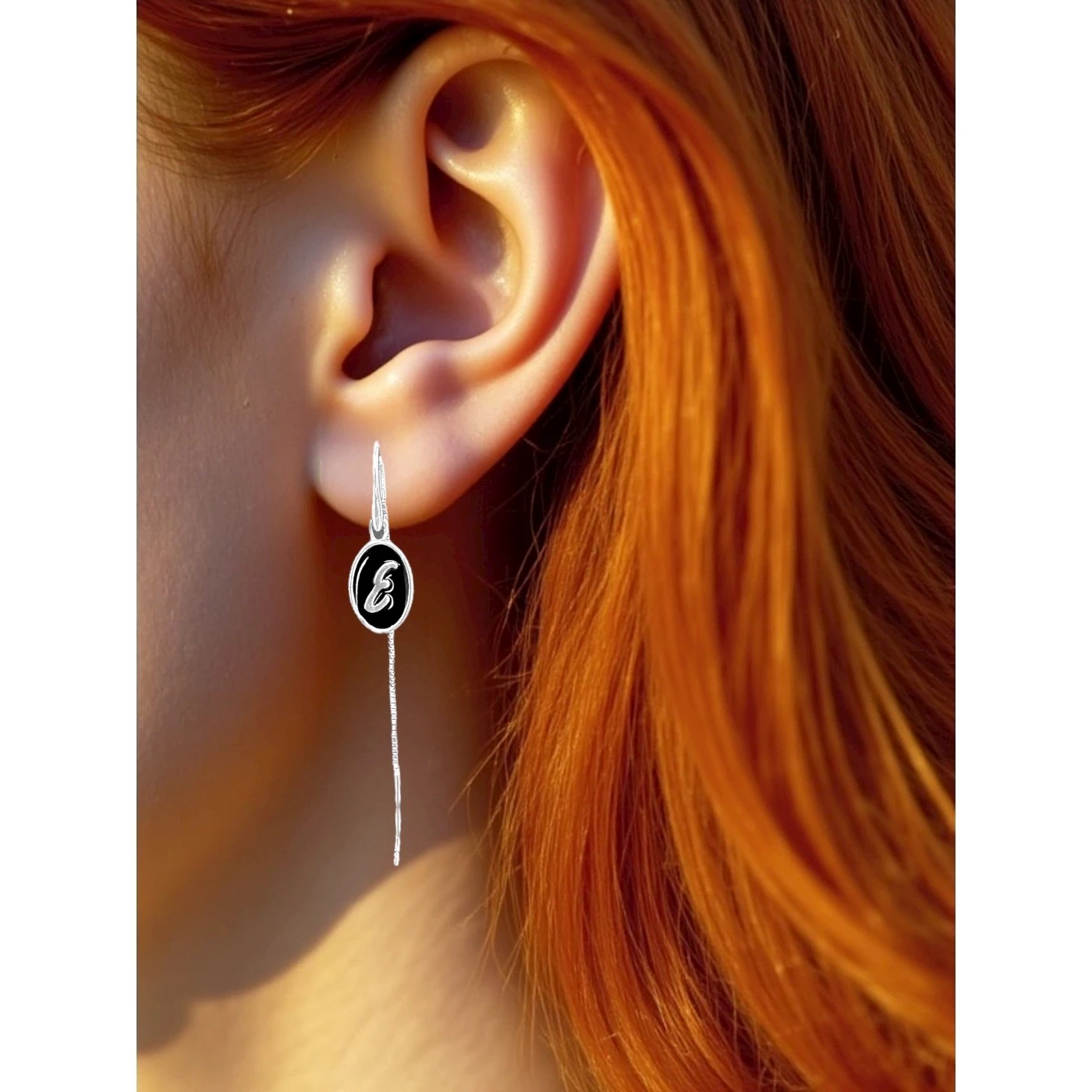 Orecchino Lettera E