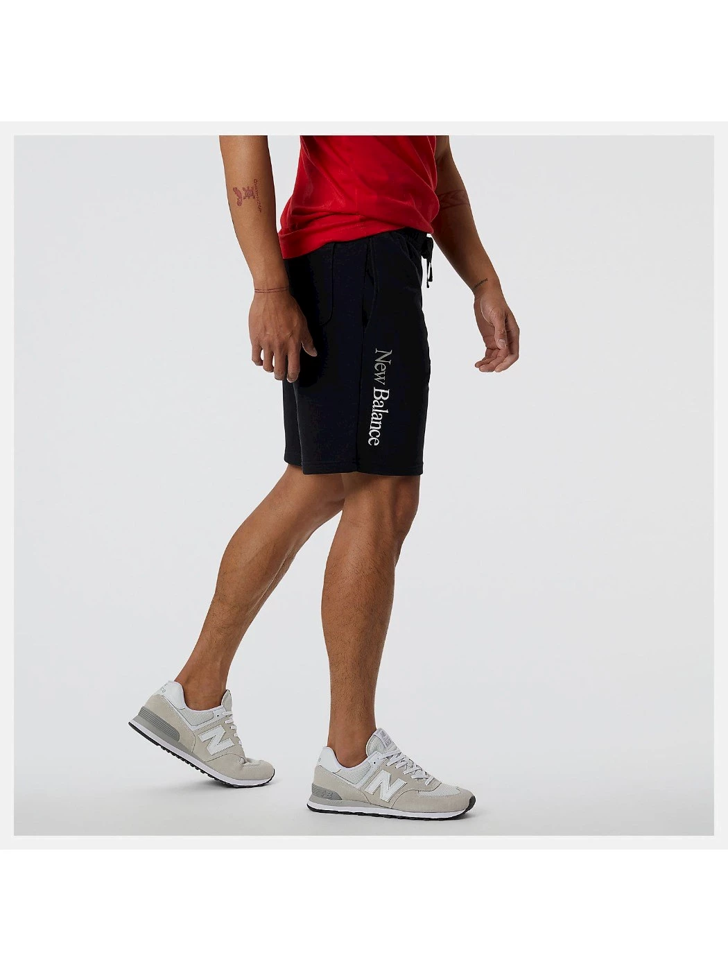BERMUDA UOMO NEW BALANCE ESSENTIALS CELEBRATE SHORT